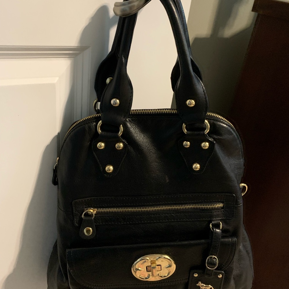 This is an Emma Fox satchel in genuine leather.